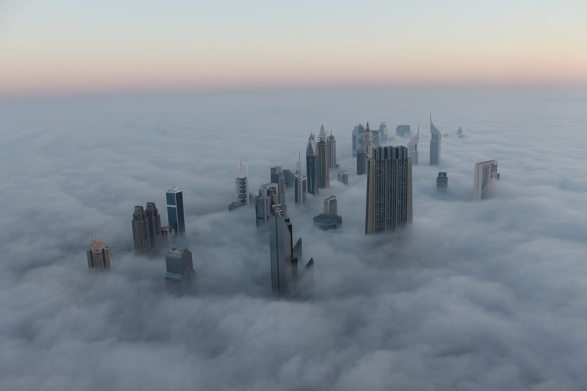 dubai skysrapers surrounded by fog