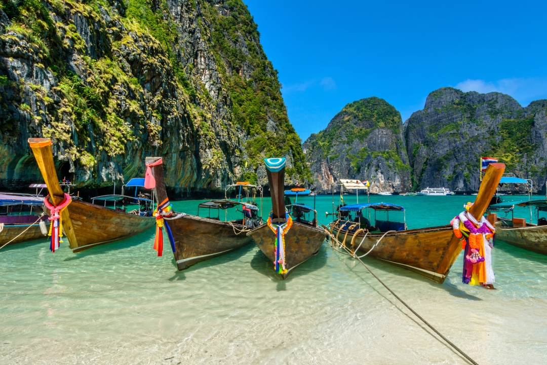 boats on an island in thailand