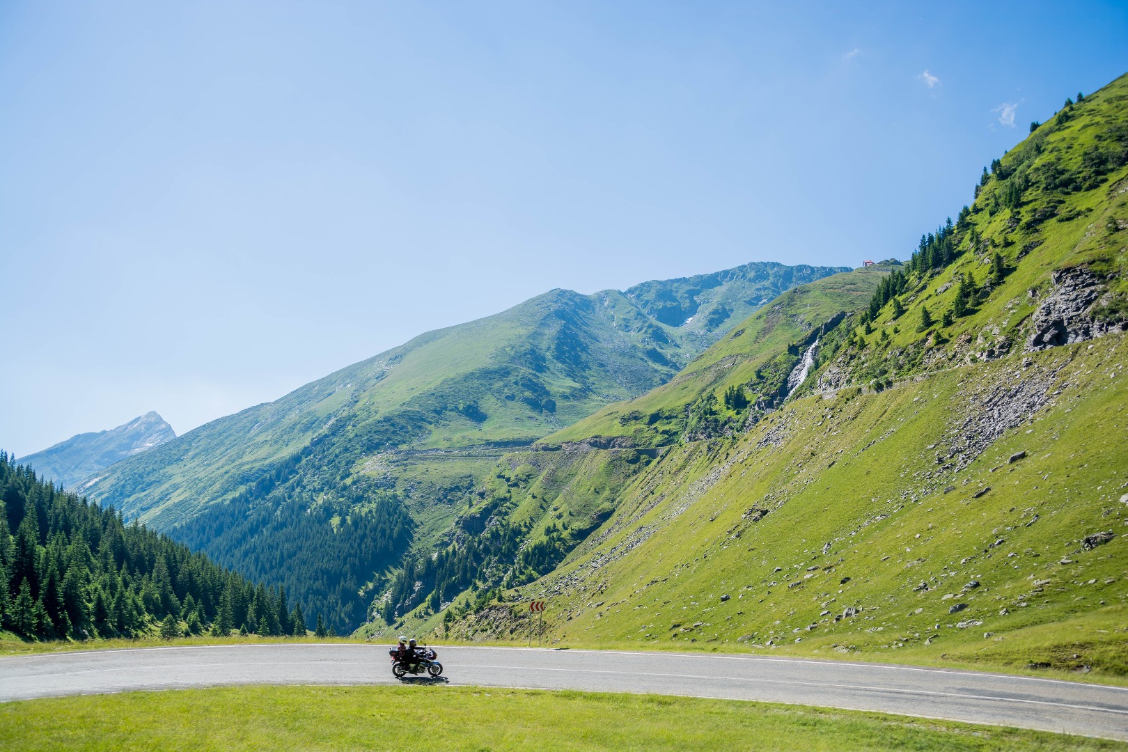 motorcycle riding through mountains