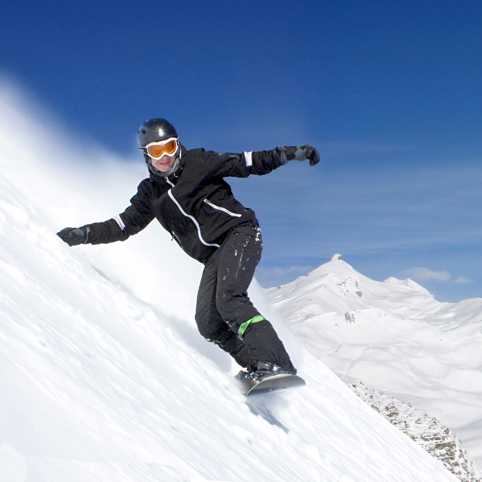 persons snowboarding